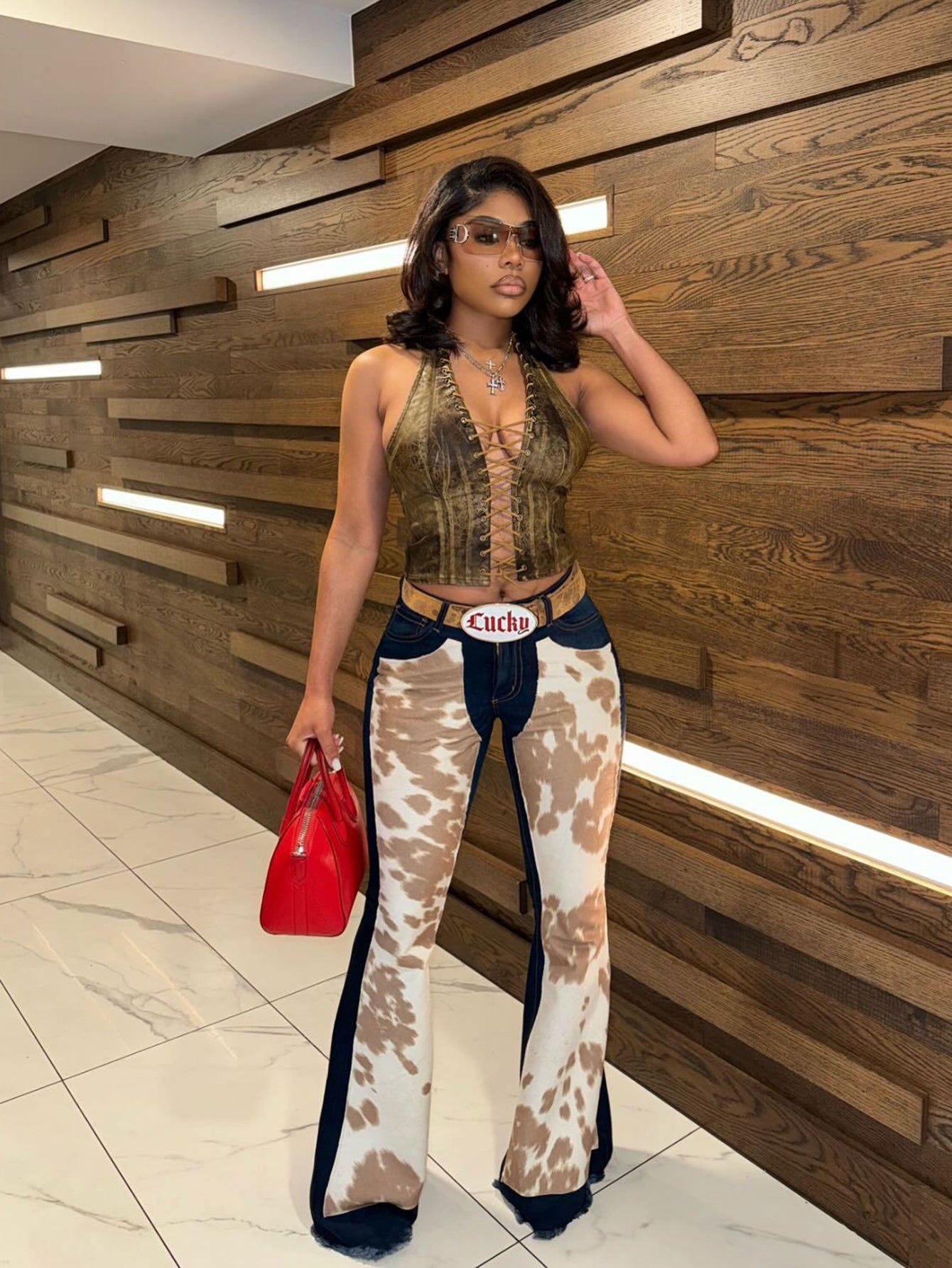 Fashionable Cow Print Patchwork High Waisted Flared Jeans