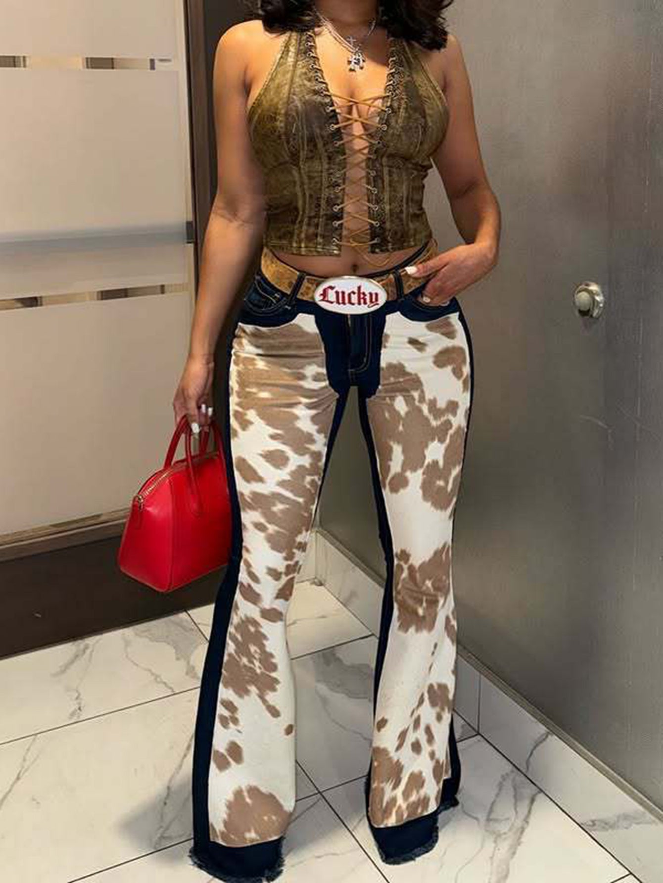 Fashionable Cow Print Patchwork High Waisted Flared Jeans